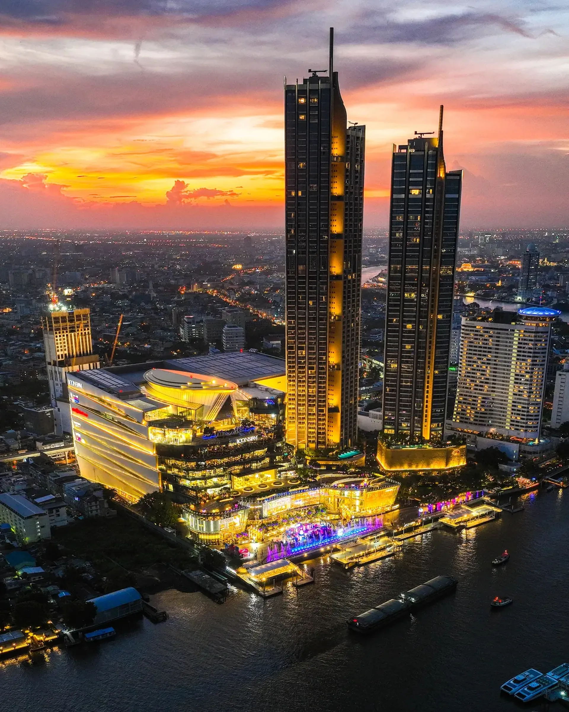 Bangkok skyline at sunset — Chao Phraya riverside with IconSiam, the CBD market underwritten in this report