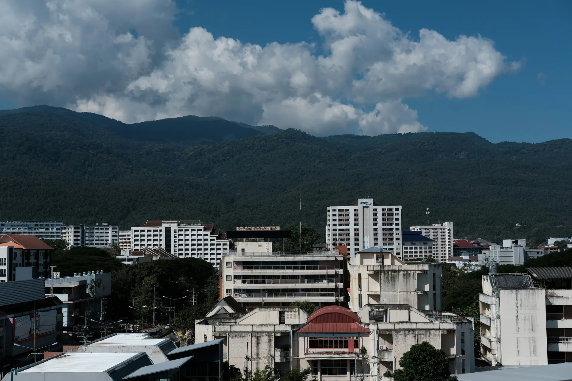 Chiang Mai condo skyline beneath Doi Suthep — the market underwritten in this report