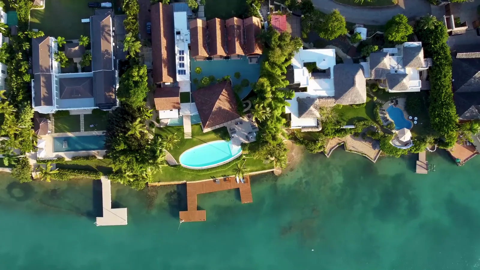 Tropical waterfront villas with private pools — the properties Brinkman Data underwrites