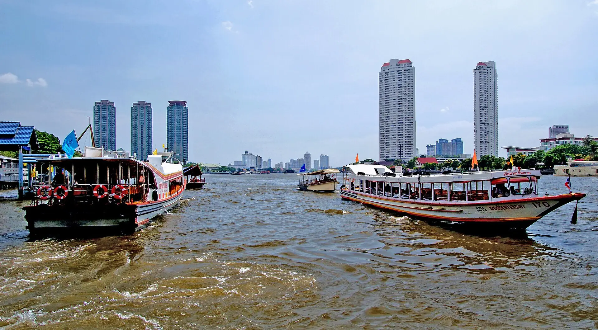Bangkok condominium towers — where a foreign-currency wire and a Land Office transfer turn into owned Thai title