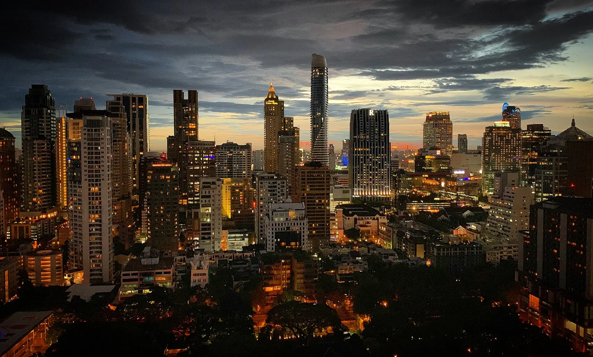 Bangkok skyline at dusk — where a British buyer's foreign-currency transfer becomes a documented Thai condo purchase