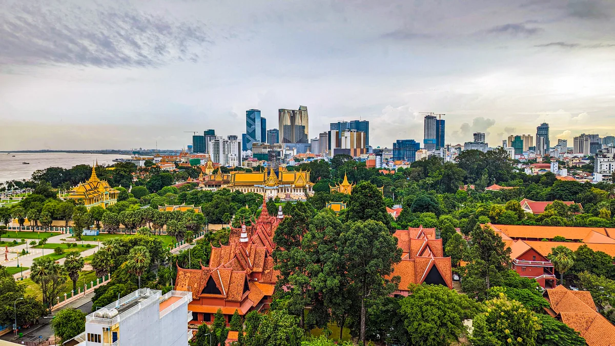 The Phnom Penh skyline, where a foreign buyer's options are set by the co-owned building law