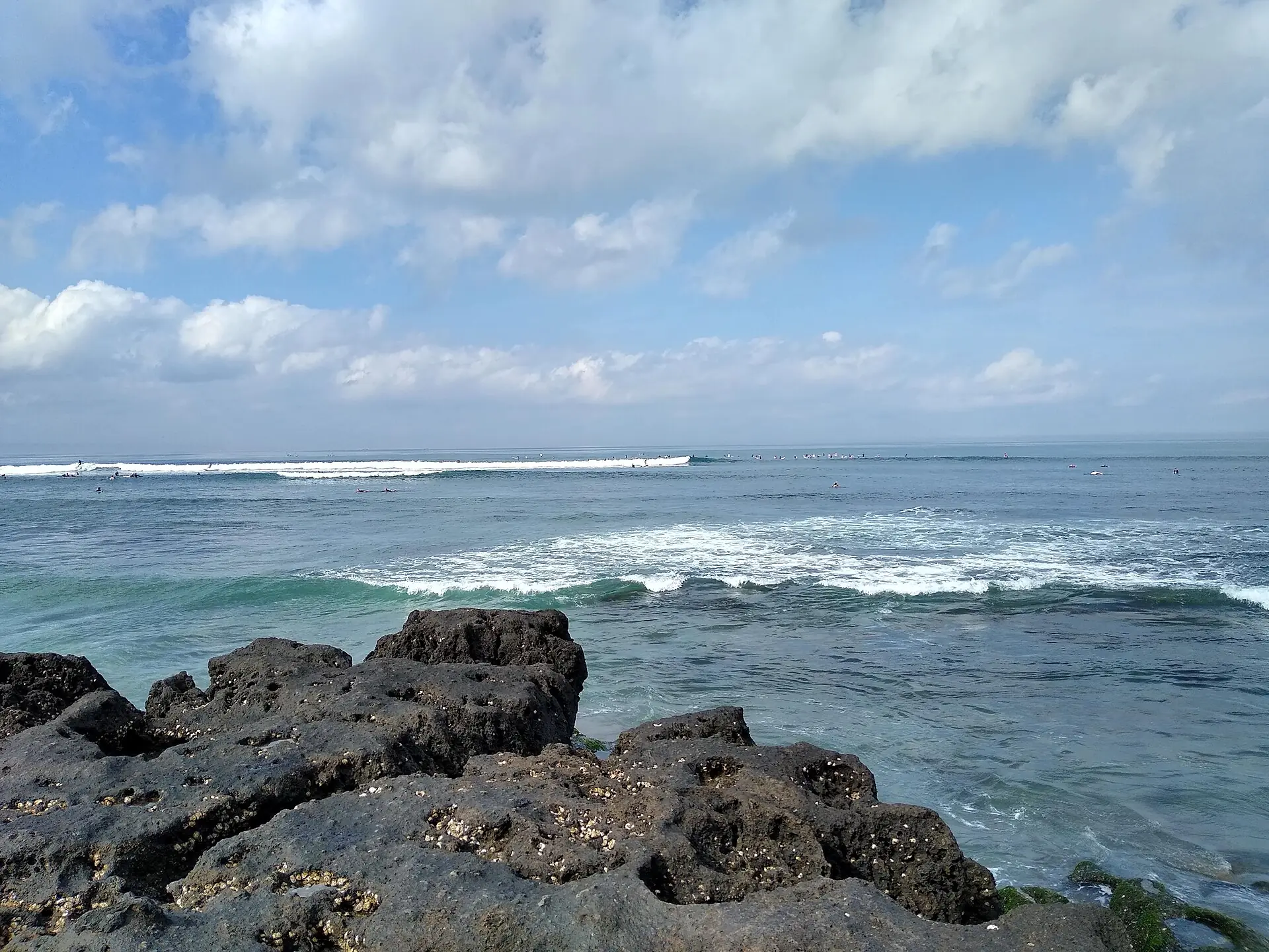 A Bali coastline at dusk — where the brochure's peak-season yield meets the spreadsheet's blended-occupancy net