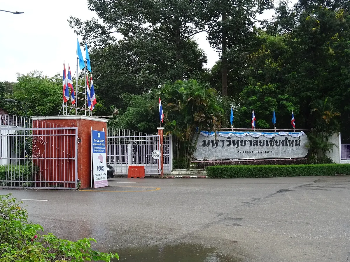 The Chiang Mai University front gate on Huay Kaew Road — the anchor of the Jed Yod / Chang Phueak catchment with the newest family-size condo stock