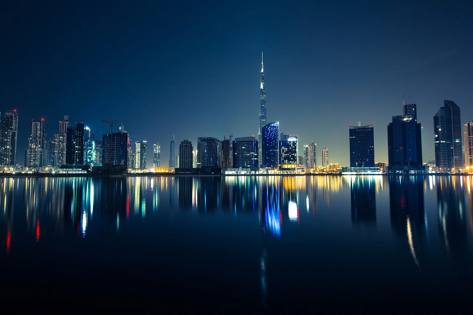 The Dubai skyline at night. Where a UAE-based buyer's remote Thai condo purchase begins
