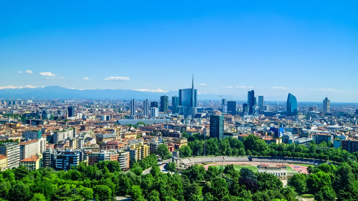 Milan's apartment districts and the Porta Nuova skyline, for the rules on who can buy Italian property