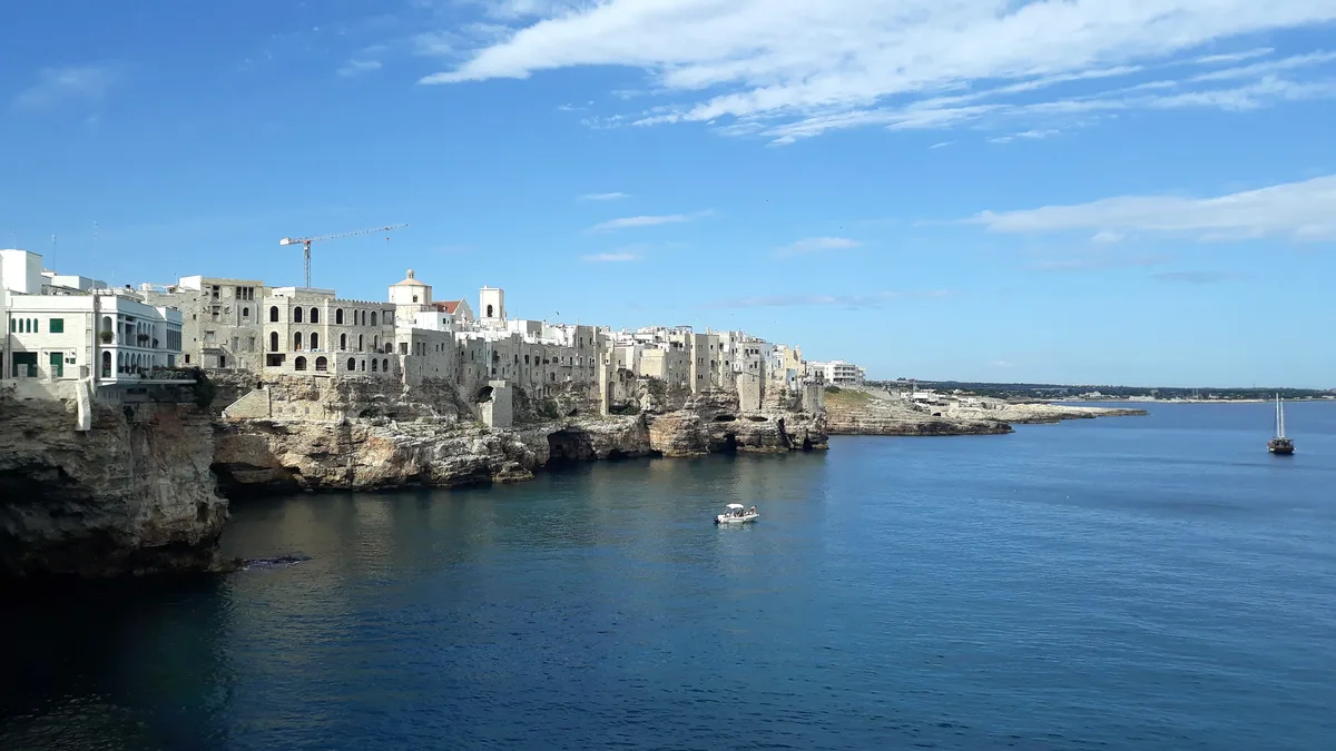 Polignano a Mare's clifftop old town in Puglia, for sourced Italian rental yield figures