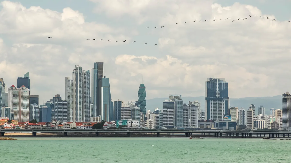 Panama City skyline across the bay: the annual property tax and other taxes a foreign owner meets
