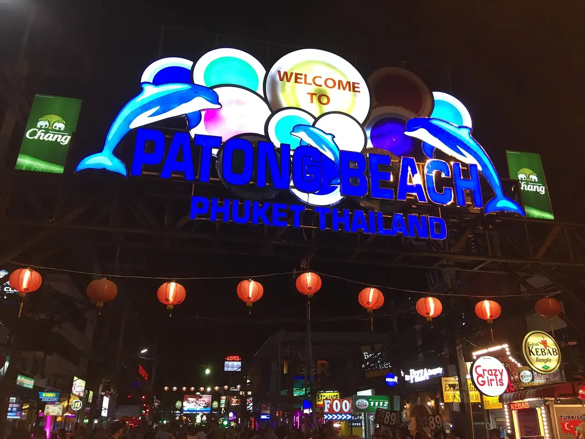 The Bangla Road gate at Patong Beach at night — the mass-tourism rent engine of the Phuket condo market