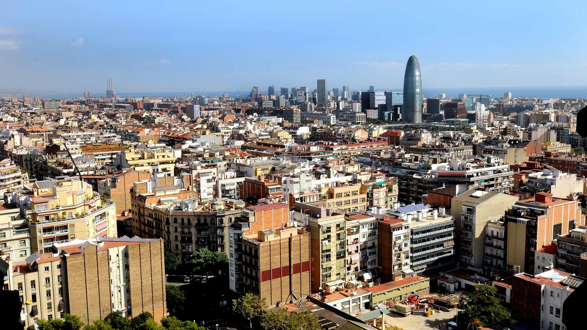 Barcelona's residential blocks running to the sea, a city with no nationality limit on buying homes