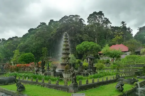A Bali villa garden — staff, banjar, PBB, OTAs: the fee stack between gross and net