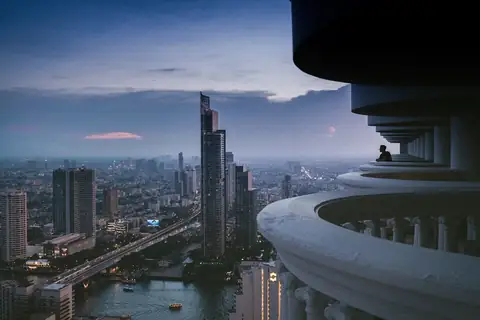 Bangkok skyline at night — the Thailand property data the analytics framework is built on