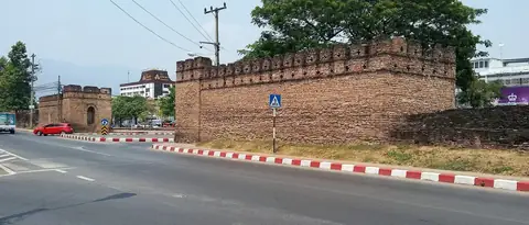 Chang Phueak Gate on Chiang Mai's north moat — Santitham, the city's best-value condo area, starts one block behind it