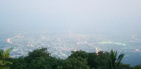 Chiang Mai at sunset — the same skyline reads differently to an investor and a tourist