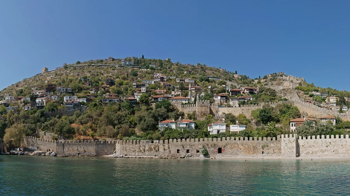 Homes on the hill above Alanya's harbour: building tax is charged on the tax value, not the price