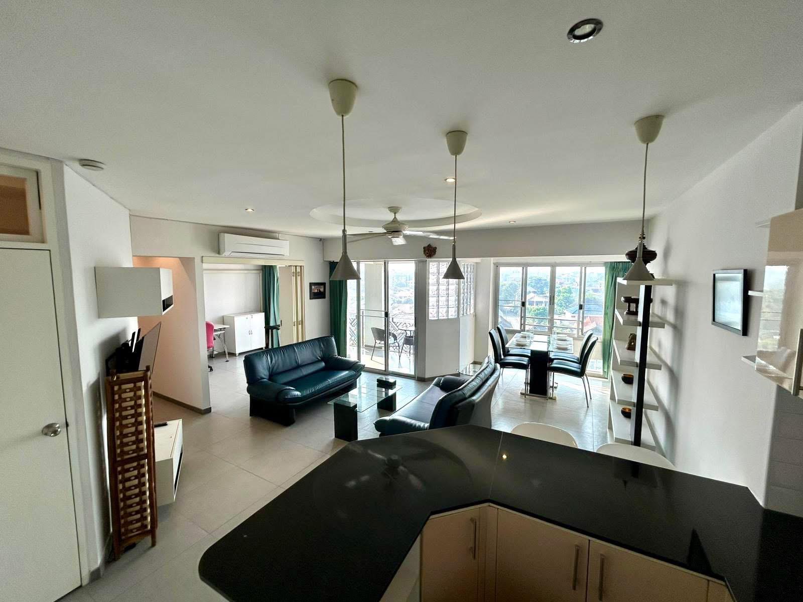 A verified Chiang Mai freehold acquisition yielding 8.15% net. Open-plan living, dining and kitchen with a balcony overlooking the city.